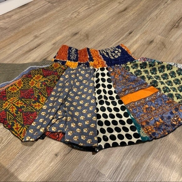 Bold patterned shorts. Says one size on tag but fits best on small. - Picture 2 of 4